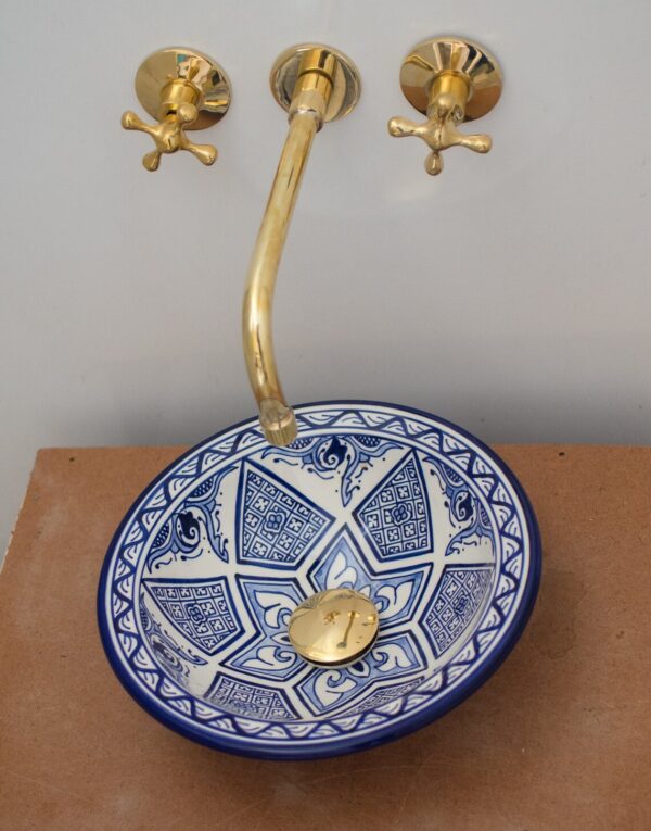 Unlacquered brass wall mount faucet with two holes for easy installation